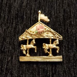 Vintage 1928 Gold Tone Carousel Horse Brooch with Pink Porcelain Rose Accent